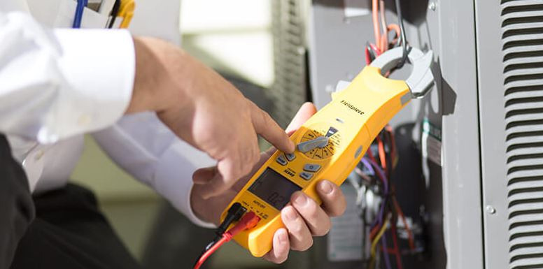 servicing an air conditioner