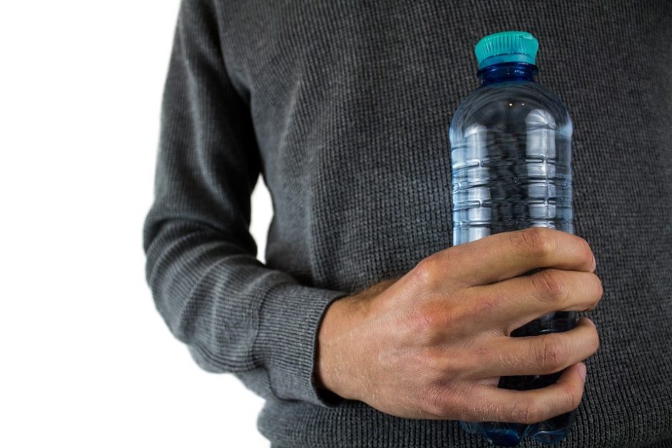 man holding water